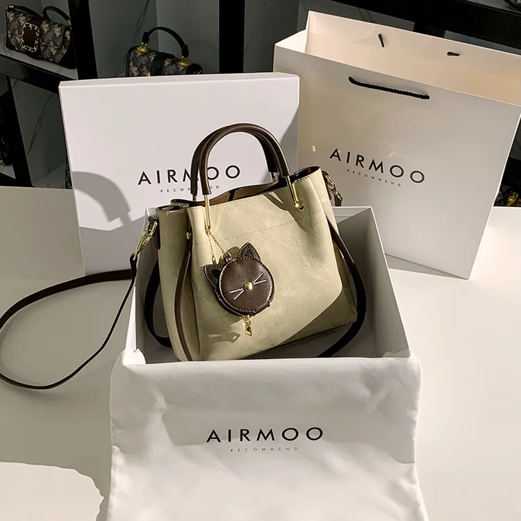 AIRMOO/艾姆轻奢真皮包包女士生日礼物水桶包高级质感手提斜挎包