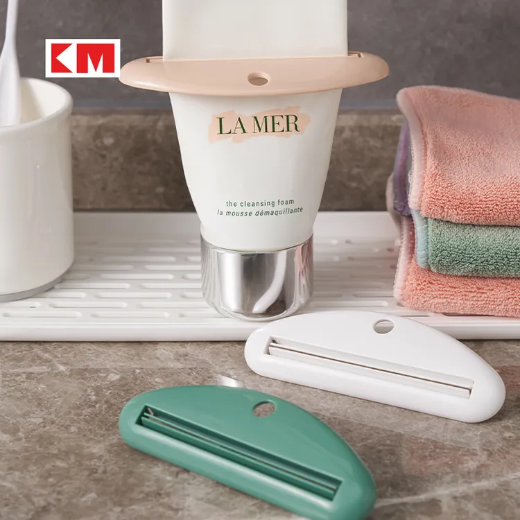 KM大号挤牙膏器牙膏夹子洗面奶护手霜挤压器家用手动挤牙膏卷压器