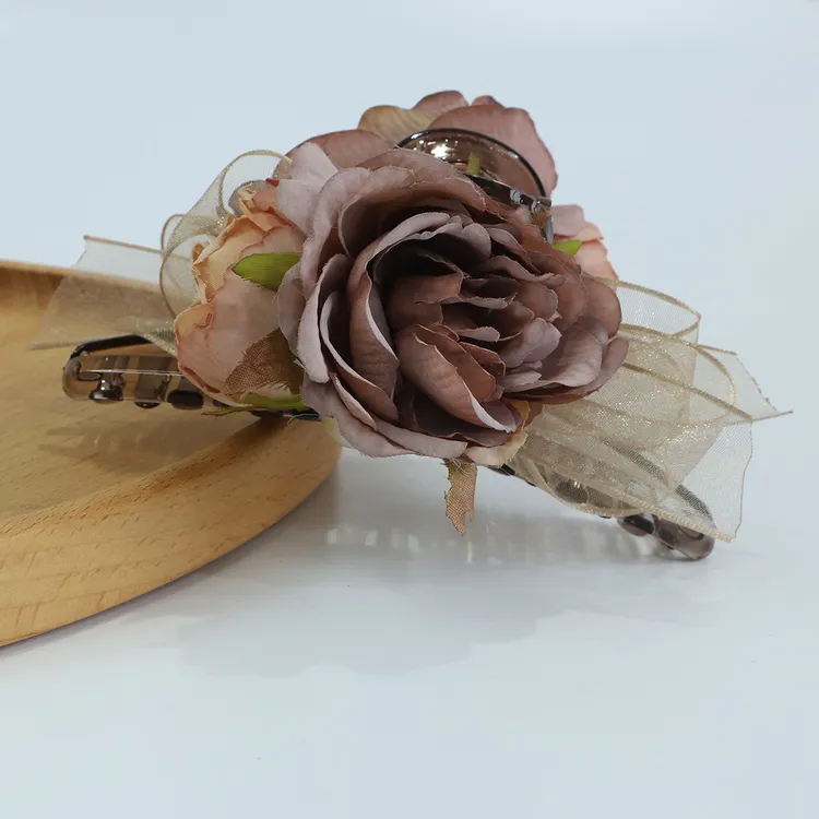 21088   w落日可可 花朵蝴蝶结抓夹13cm