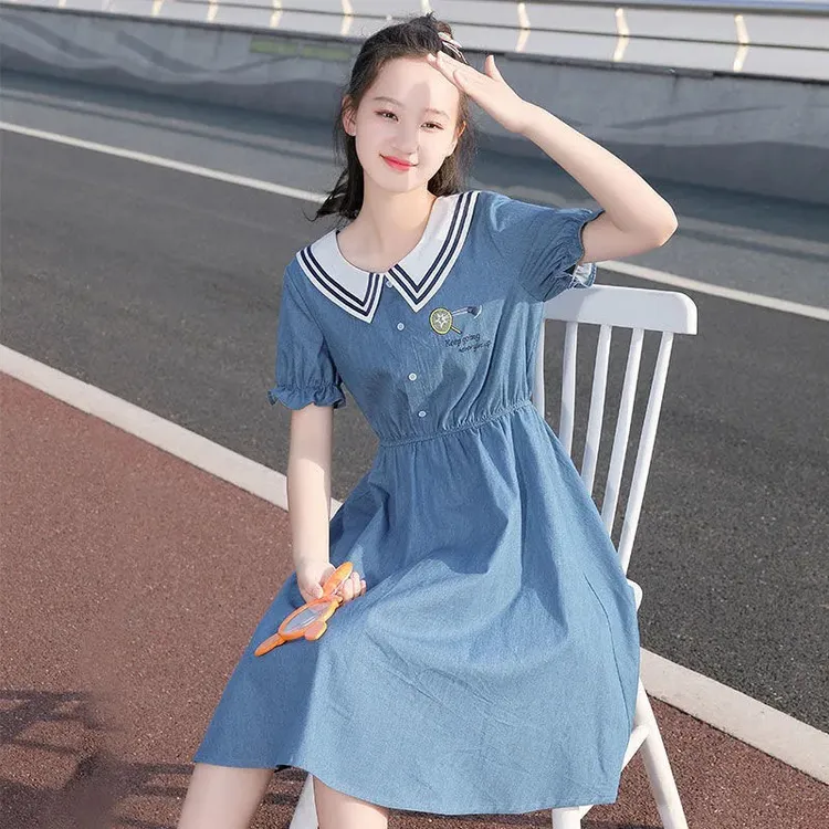 中学生牛仔连衣裙夏季娃娃领2025新品收腰中长款绣花初中生裙子薄