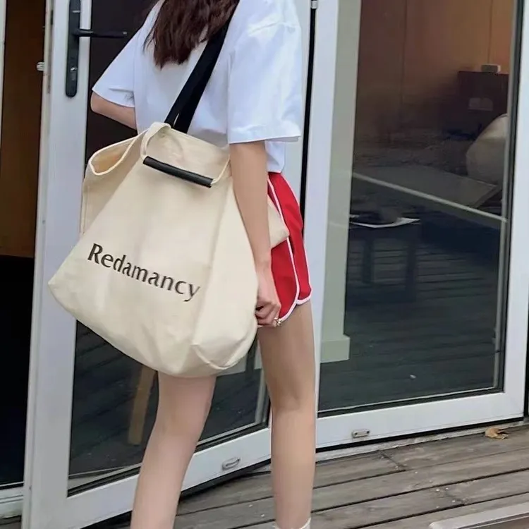 慵懒大牌休闲百搭通勤帆布包女大容量单肩包手提托特包学生拎书袋