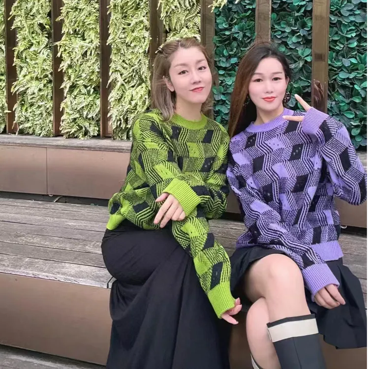 阿5399754秋冬新款百搭时尚长袖宽松提花镂空圆领针织毛衣