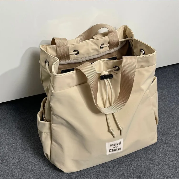 (43*12*38cm)    休闲双肩包百搭高级感抽绳包小女生纯色手提背包