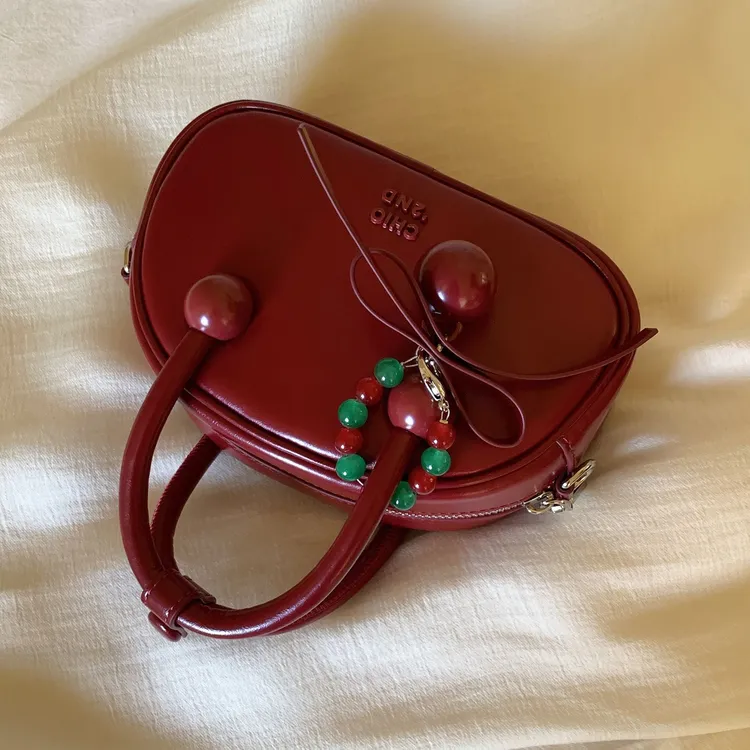 南风Chio2nd枕头包小众红色精致小包包女婚包手提单肩