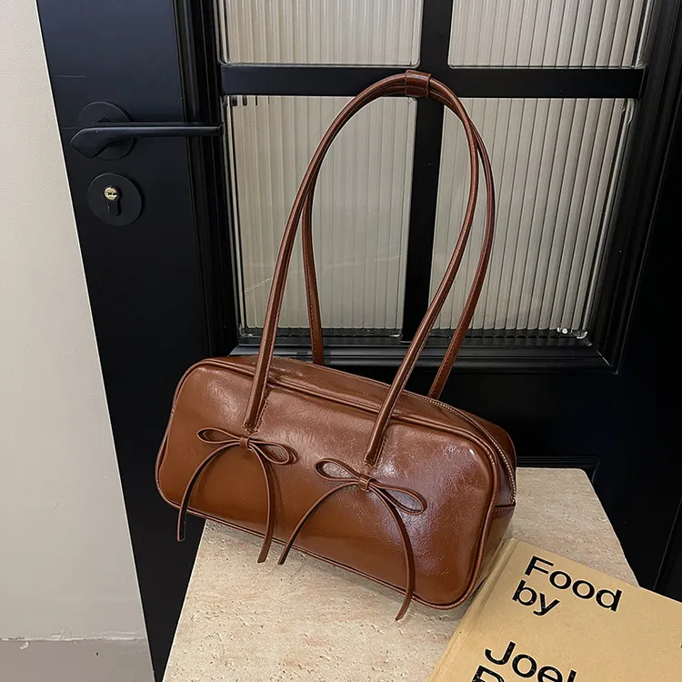 蝴蝶结腋下法棍包2025秋冬新款复古时尚百搭单肩包包高级感ins风