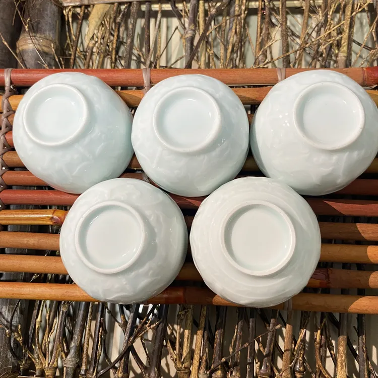 景德镇陶瓷精品功夫小茶杯高温柴窑高白泥纯手工浮雕莲花百川杯