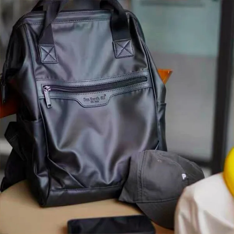 限量黑金版~sunearthu新款双肩包女防水背包男大容量学生书包运动