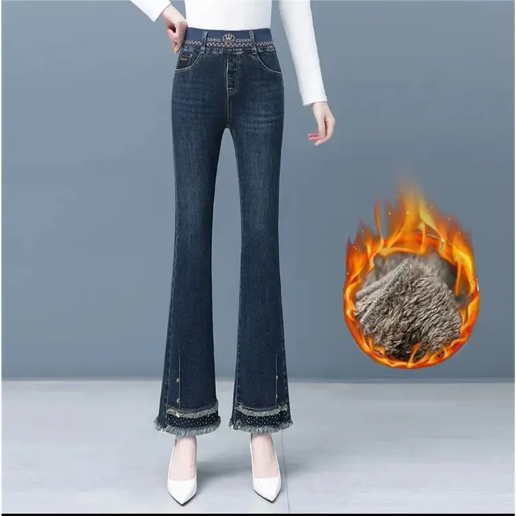 羊羔绒微喇牛仔裤女士冬季新款松紧高腰显瘦加绒加厚毛边喇叭裤子