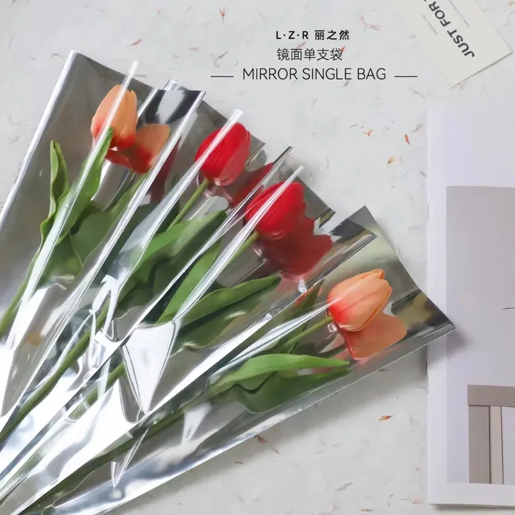 新款镜面高级感玫瑰鲜花束包装纸透明花艺资材花店手工包花纸材料