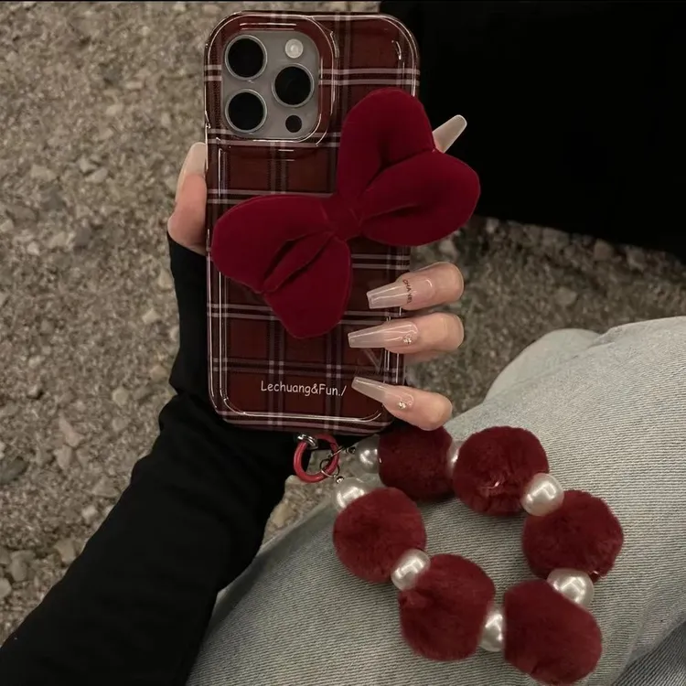ins风格纹蝴蝶结手链适用iPhone15苹果14新款13promax手机壳12/11