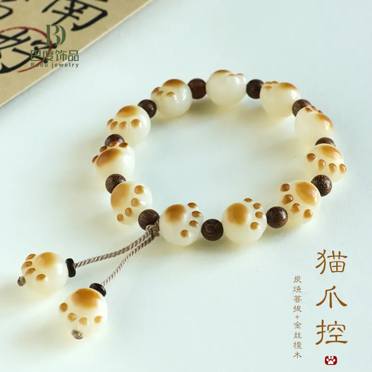 爆款可爱白玉菩提根炭烧招财猫爪手链女金丝檀木流苏红玛瑙手串