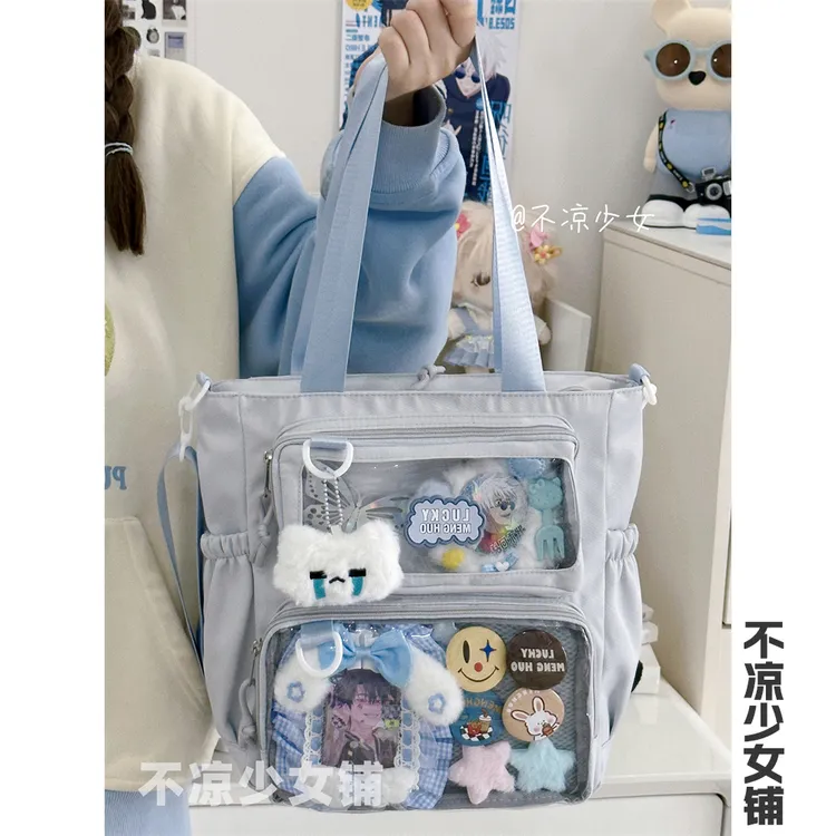 二次元大容量斜挎包日系ins漫展少女单肩包透明吧唧扎板痛包娃包