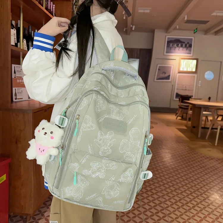 书包大学生设计感ins风小众新款印花涂鸦大容量高中初中生双肩包