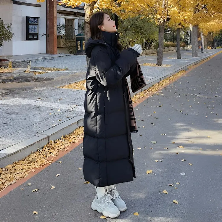 黑色羽绒服女冬季2025年新款中戏长款过膝学生宽松加厚保暖情侣款