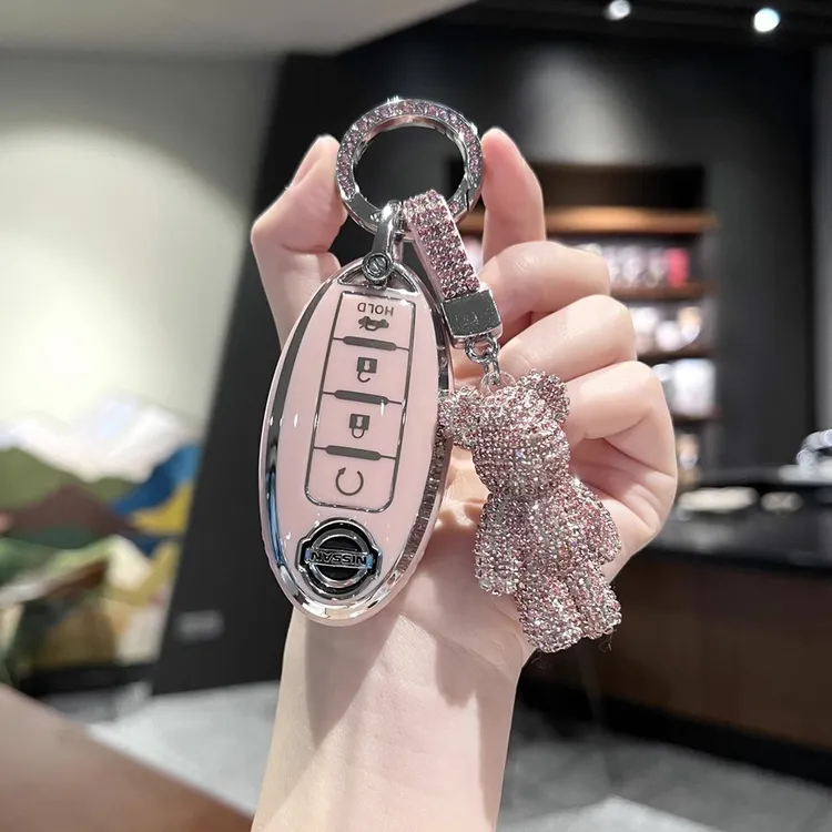 适用日产14代轩逸钥匙套适用奇骏天籁高档女粉壳逍客骐达途达楼兰