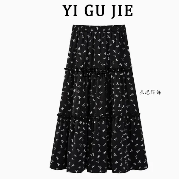 2025时尚黑色蝴蝶结印花半身裙女春季新款小众高腰遮肉显瘦a字裙