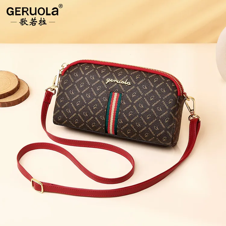 单肩斜跨包女士2025新款手拿包可放雨伞时尚印花迷你钱包手机包女