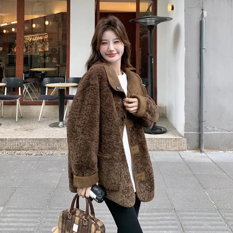 咖色设计感两面穿皮毛一体外套女2025冬季新款高级感百搭加厚棉服