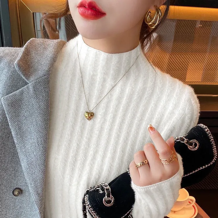 软糯温柔毛衣女秋冬新款水貂一体绒针织半高领内搭加厚打底衫