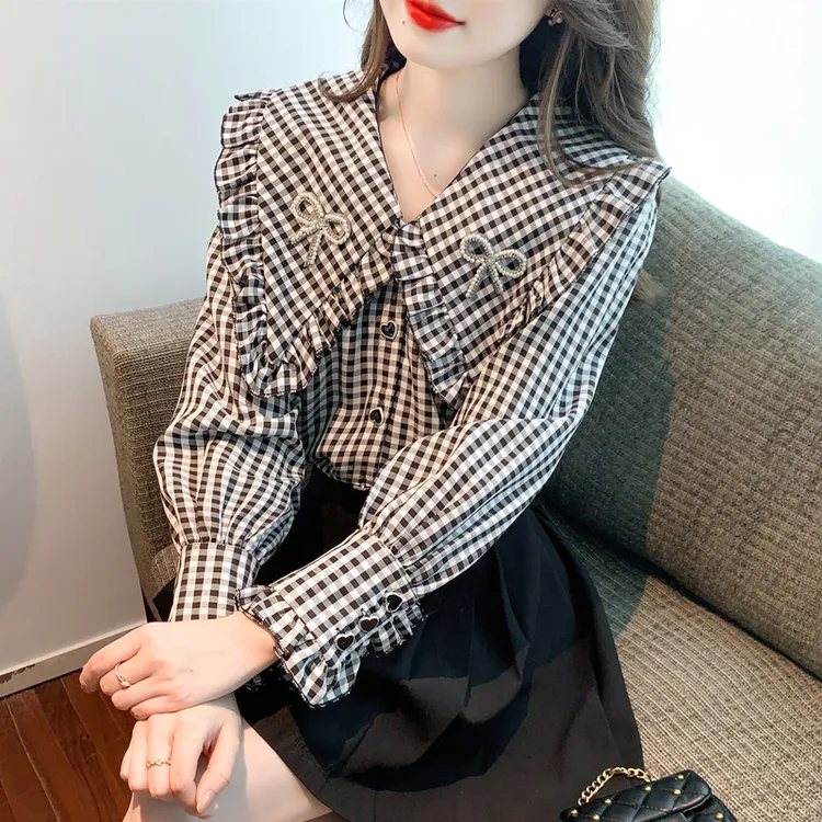 2025春季新款复古格子大翻领蝴蝶结衬衫女设计感小众百搭上衣