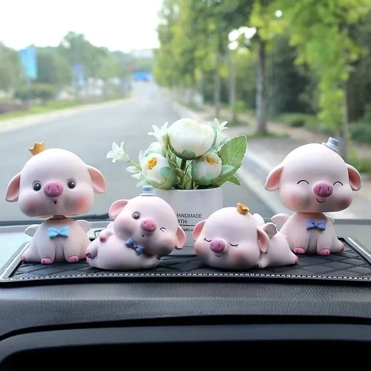 汽车用品中控台装饰品摇头小猪香水摆件高档车上公仔新款女神可爱