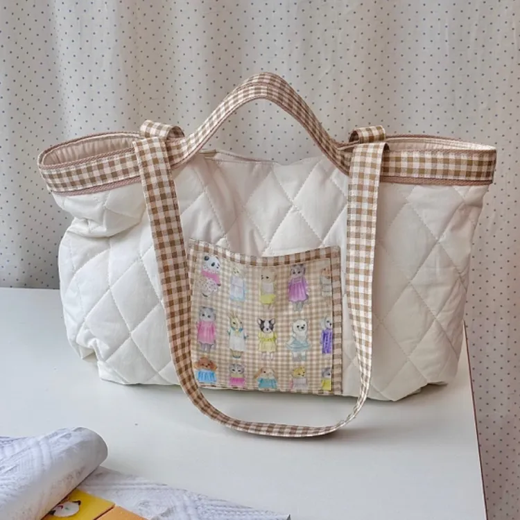 白色菱格好大一只包