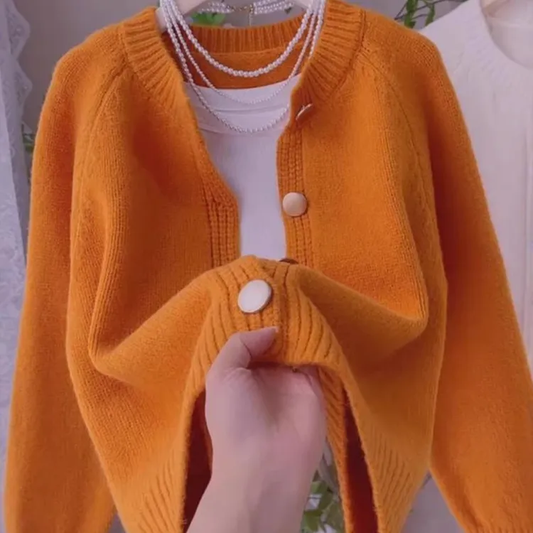 橘色单排扣针织开衫女秋冬新款设计感韩版宽松慵懒风软糯毛衣外套