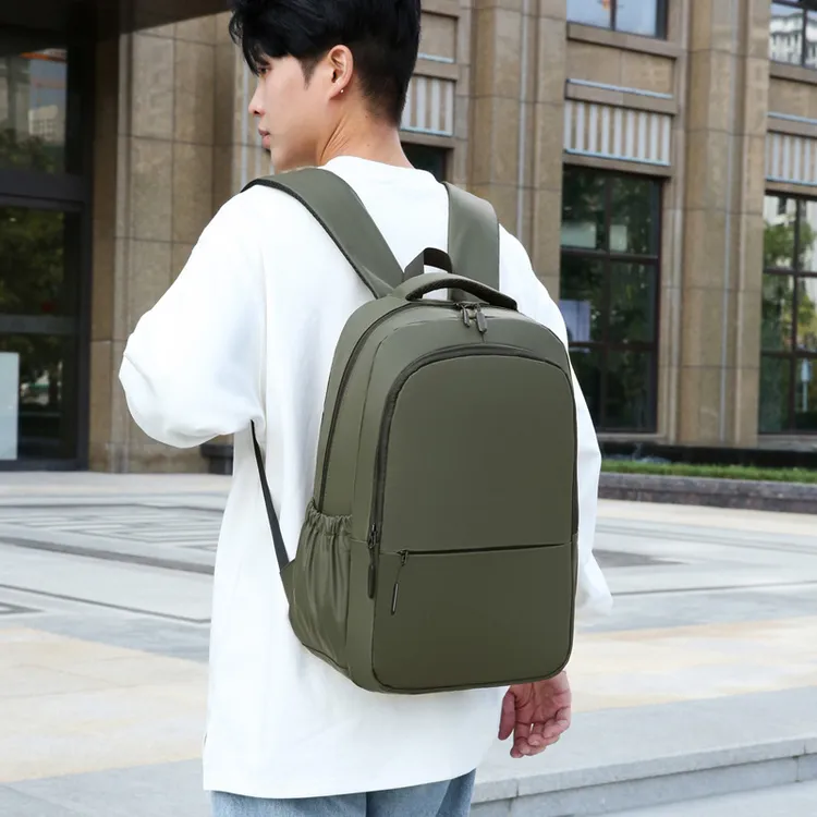 时尚休闲双肩包潮高级感大容量男士旅行背包女防水电脑包双肩书包