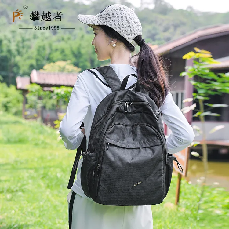 大容量双肩包女士背包休闲防水旅行包大学生初中书包男包新款