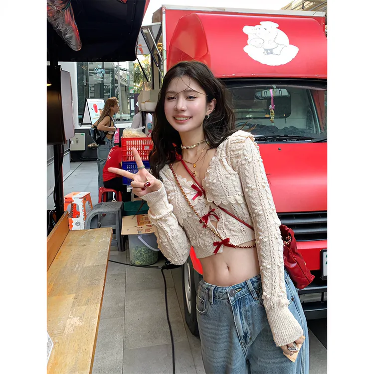 针织衫女士早春季法式蕾丝镂空蝴蝶结设计感气质小众显瘦长袖上衣