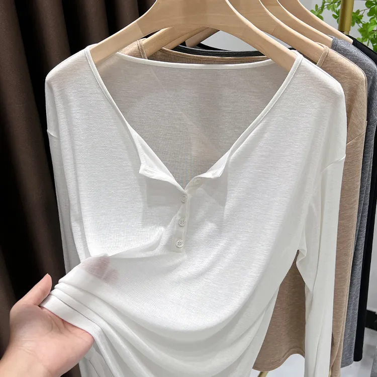 白色长袖T恤女春季新款设计感纽扣半开领上衣薄款微透内搭打底衫