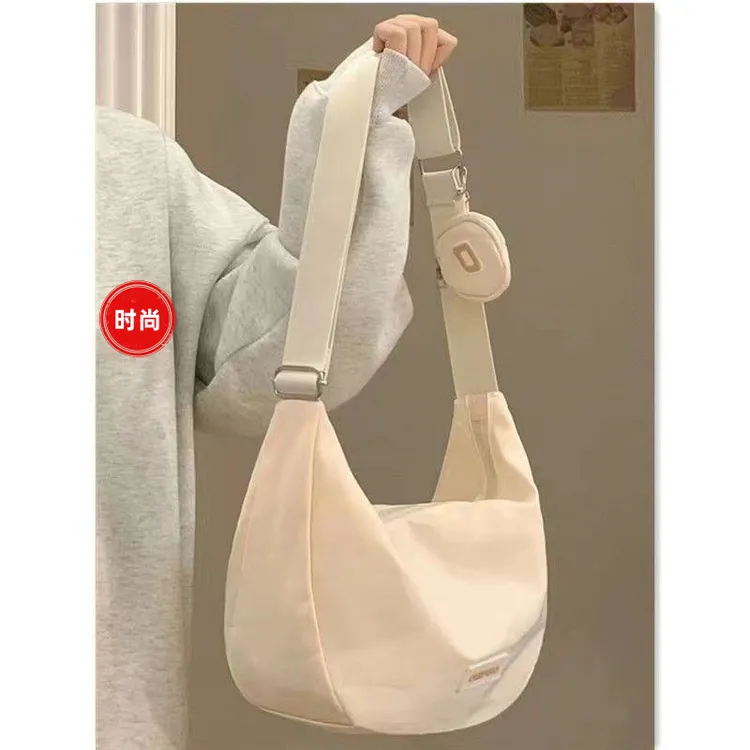 尼龙防水帆布包时尚潮包春夏森系文艺饺子包大学生上课单肩斜挎包