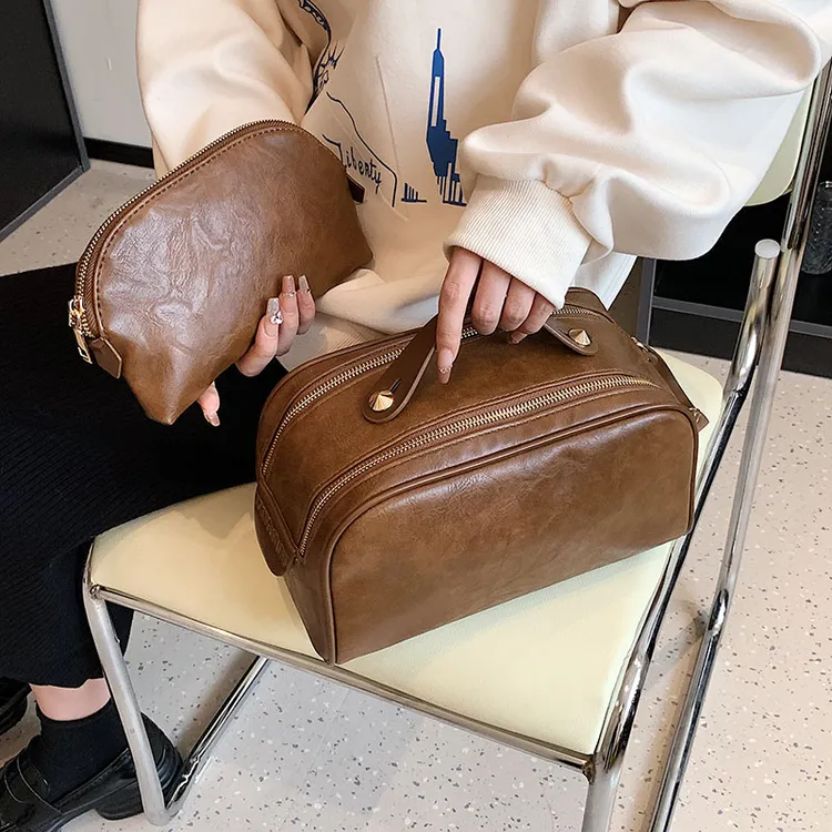 化妆包韩版女大容量2024高级感复古护肤品收纳包手提洗漱便携包袋