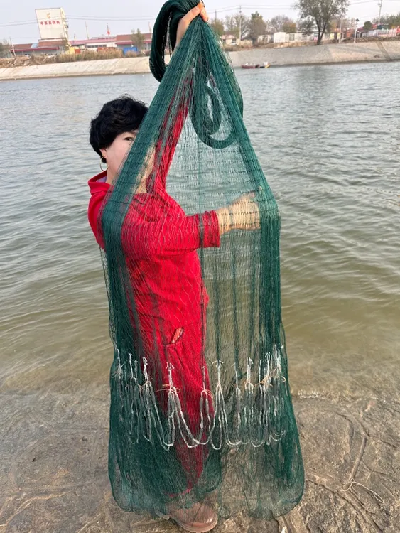 绞丝四股线两指网眼，四米高，直径六米，重八斤，铅坠，纯手工