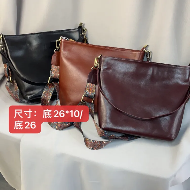 6310牛皮斜挎腋下斜挎宽肩带多隔层水桶包