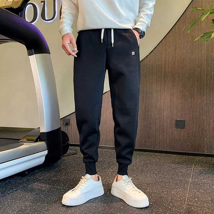 2025新款常规款加绒加厚冬季刺绣宽松卫裤束口运动风修身型九分裤