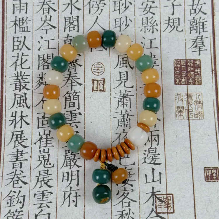 （送盘玩袋、弹力绳）单圈多宝菩提根白南瓜橄榄核吊坠手串