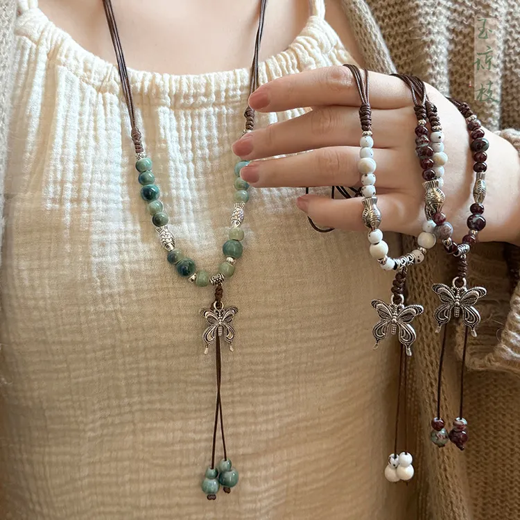 合金项链 复古民族风陶瓷串珠蝴蝶项链女轻奢小众锁骨链流苏配饰