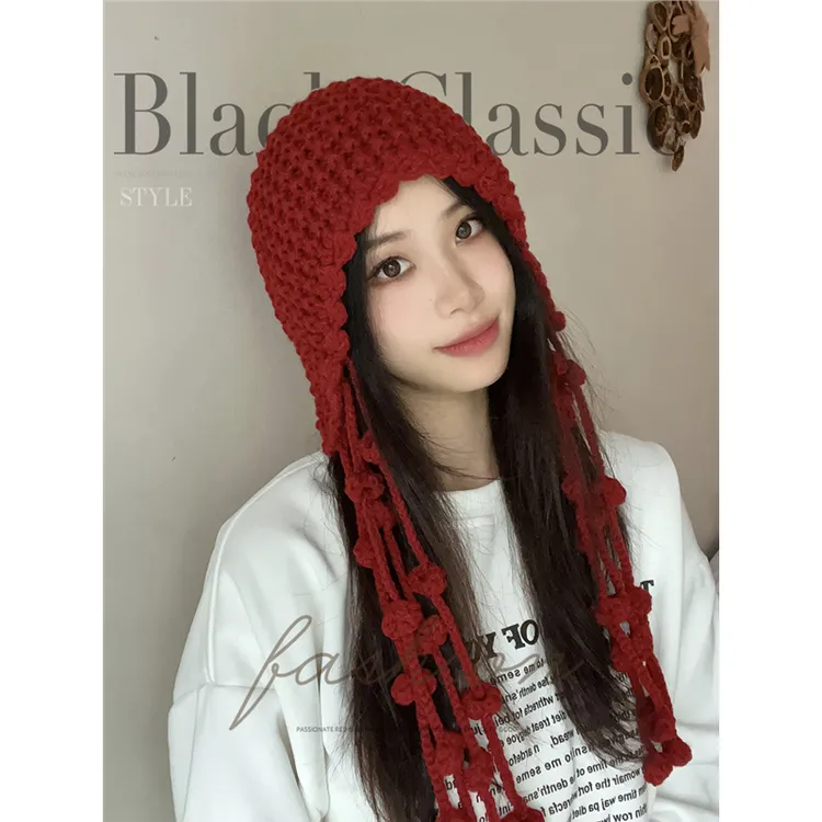 纯手工编织流苏针织帽女神秋冬季镂空凹造型护耳雷锋帽小众毛线帽