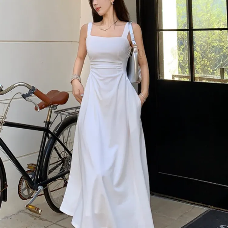白色吊带连衣裙子女2024夏季新款法式茶歇小个子初恋收腰a字长裙