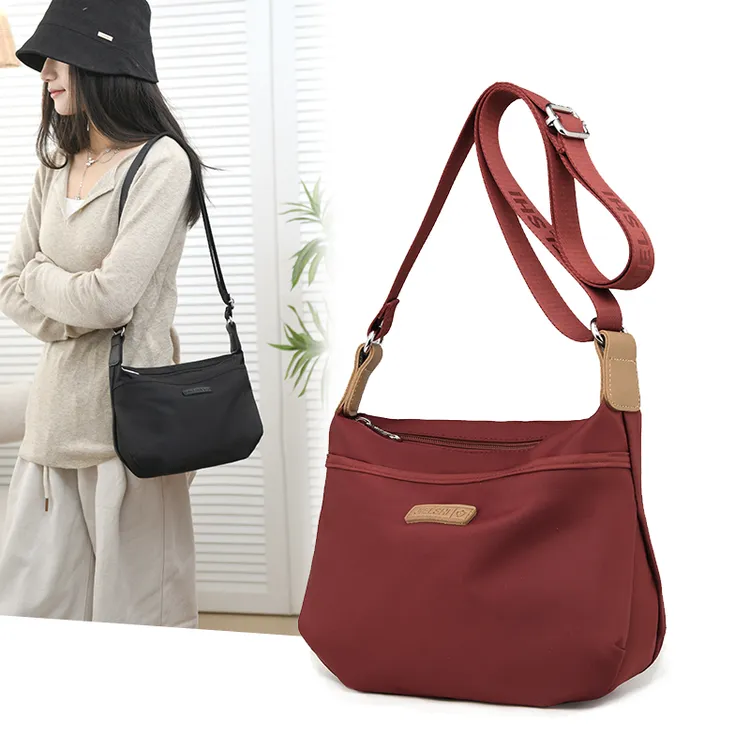 (868-2)女斜挎包大容量尼龙单肩包简约百搭牛津布女慵懒风邮差包