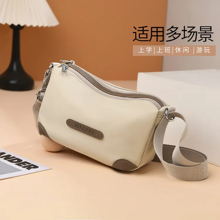 (6-051)设计感饺子包牛津布新款百搭斜挎包休闲轻便女单肩包百搭