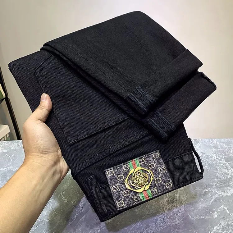 古利施普男士秋冬黑色牛仔裤轻奢潮款经典黑修身小直脚弹力休闲裤