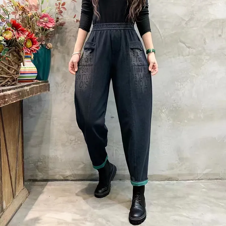 春新款高档大码黑色牛仔裤胖妈妈装遮肉显瘦哈伦裤松紧腰老爹长裤