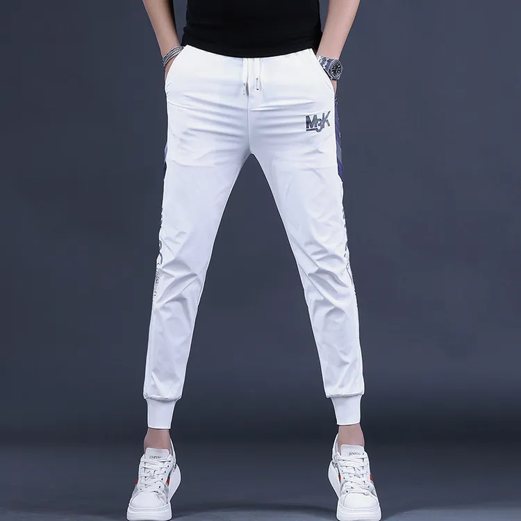 夏季潮牌休闲裤男士印花修身束脚弹力男裤冰丝运动小脚长裤白色潮