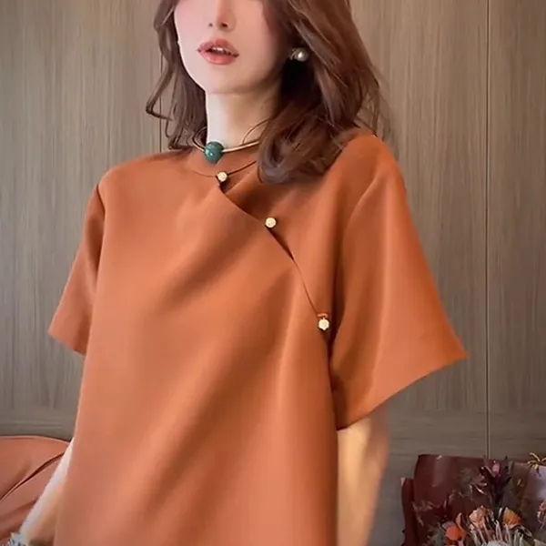 新中式国风独特橘色连衣裙子中长款2025新款夏季休闲宽松旗袍女装