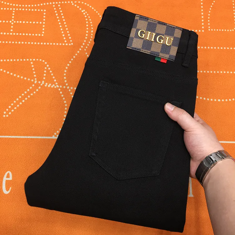 秋冬款黑色牛仔裤男直筒宽松欧货修身小脚长裤轻奢男装纯黑九分裤