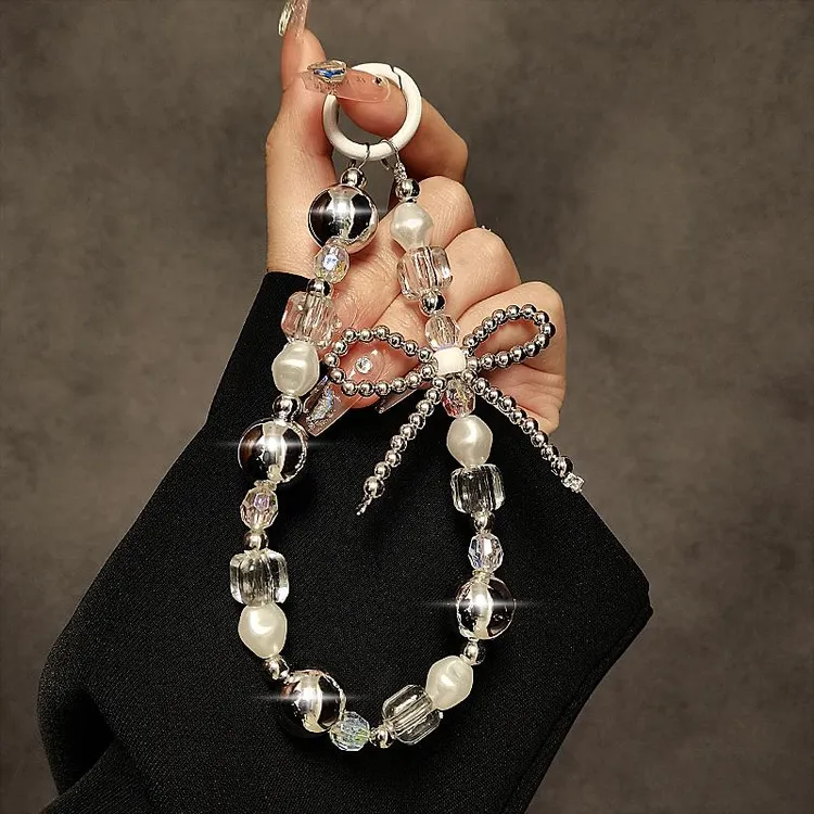 个性蝴蝶结串珠手提链条手腕短挂绳夹片壳钥匙包新款个性创意手绳