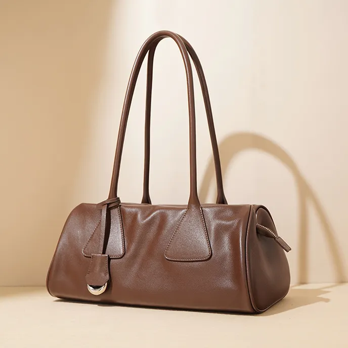 双11新款高级感单肩腋下复古法棍包包女三角包手提斜挎包保龄球包