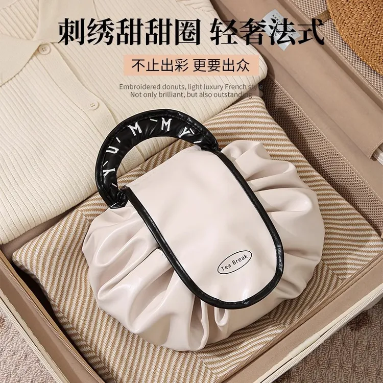 懒人抽绳化妆包大容量女2024新款便携可爱ins风超火化妆品收纳包